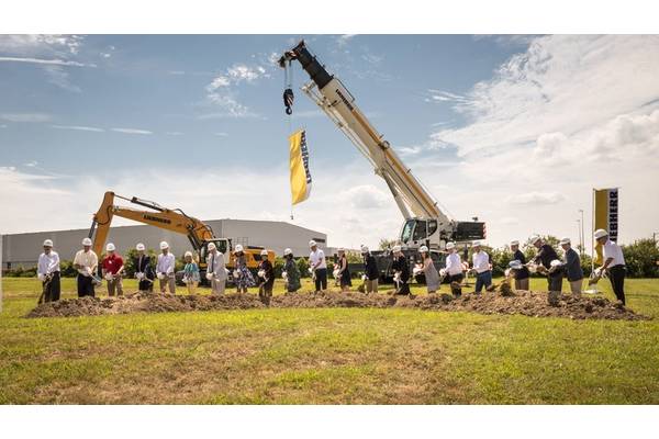 With shovels in hand, Sophie Albrecht, Jan Liebherr, Liebherr USA, Co. Managing Directors, its building partners and government officials broke ground during the ceremony. (Image: Liebherr)