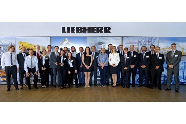Staff from Liebherr Argentina celebrating the opening of the Buenos Aires subsidiary with members of the Liebherr family (Photo: Liebherr)