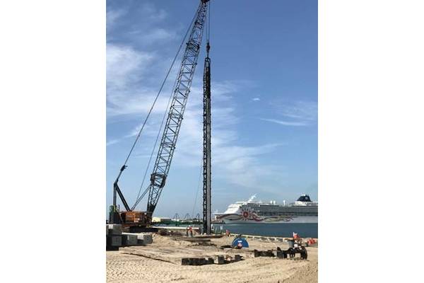 Workers from Orion Marine Group position concrete relieving piles for installation at North Cargo Berth 8 (Photo: Canaveral Port Authority)
