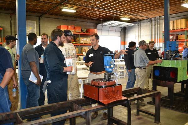 Wärtsilä Contract Management General Manager, Sean Carey provides a tour of cylinder head reconditioning processes available at the new Seattle workshop.